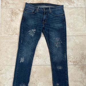 Levi’s 511 distressed jeans